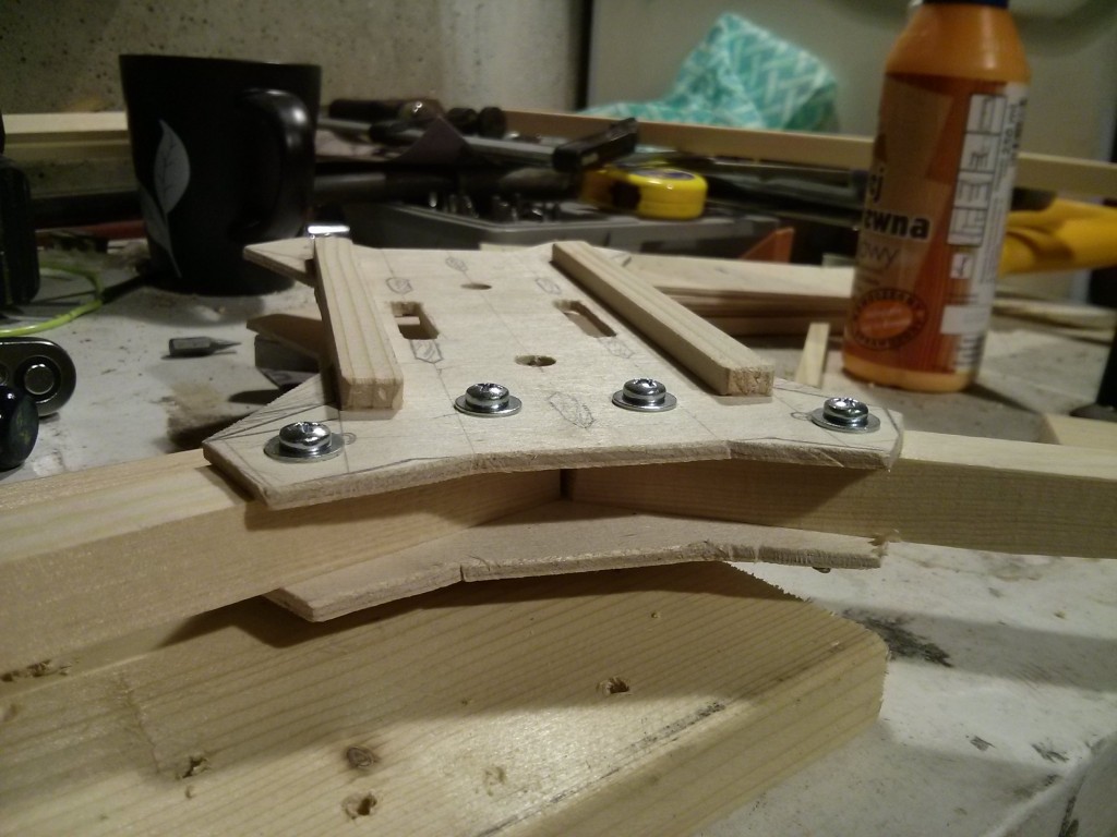 Front arms attached to central plate